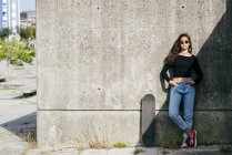 Trendy girl and skate — Stock Photo