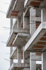 Exterior view of unfinished balconies on building facade — Stock Photo