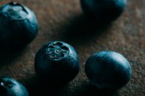 Blueberries on a grunge background — Stock Photo