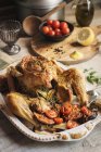 Roasted chicken with grilled potatoes — Stock Photo