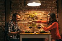 Romantic Couple Having Dinner at Home — Stock Photo