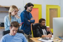 Portrait of  multi-ethnic business people at workplace — Stock Photo