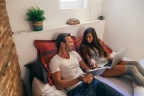 Couple in Bed Using a Laptop — Stock Photo