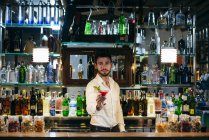 Bartender giving cocktail — Stock Photo