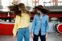 The girls shaking hair — Stock Photo