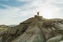 Women posing on cliff — Stock Photo