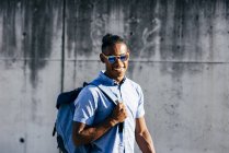 Cheerful man with backpack — Stock Photo