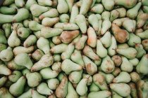 Top view of pile of green pears on farm. — Stock Photo