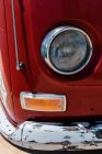 Close up view of shabby car 's headlight — стоковое фото