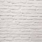 Закрыть вид на текстуру стены из белого кирпича — стоковое фото