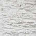 Vista de perto da parede rebocada irregular branca — Fotografia de Stock