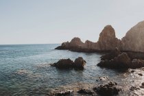 Landscape of rocky coastline in sunlight — Stock Photo