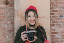 Girl with analog camera — Stock Photo