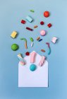 Candies and opened envelope — Stock Photo