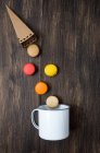 Macarons on wooden table — Stock Photo