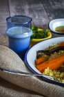 Crop traditional Moroccan Couscous with vegetables on plate — Stock Photo