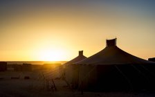 Tent in sunset rays — Stock Photo