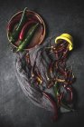 Red and green chili peppers — Stock Photo