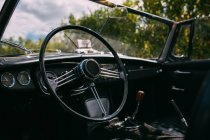 Car steering wheel and dashboard — Stock Photo