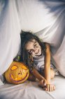 Girl with pumpkin Jack o lattern — Stock Photo