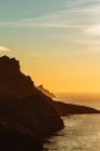 Sunlit coastal cliffs — Stock Photo