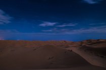 View to empty desert sand landscape in twilight time. — Stock Photo