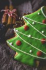 Close up view of christmas tree cookie on wooden table. — Stock Photo