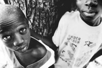 Goree, Senegal- December 6, 2017: Crop miserable kids looking at camera — Stock Photo