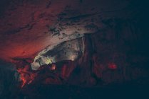Detail of illuminated ways and walls in cave. — Stock Photo