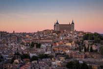 Aerial view over old town of Toledo at nightfall. — Stock Photo