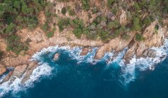 Aerial views of coastline with surfing waves of Mediterranean sea — Stock Photo