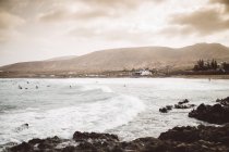 View to wavy stormy ocean shore in cloudy day. — Stock Photo