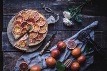 Directly above view of tasty tart with red oranges — Stock Photo
