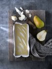 Top view of ingredients for preparing sweet pear cake on wooden board. — Stock Photo