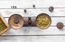 Pair of old scales and spice — Stock Photo