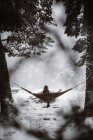 Woman in hammock in winter — Stock Photo
