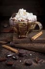 Chocolate milkshake with cream and cinnamon — Stock Photo