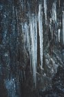 Frozen icicles on cliff — Stock Photo