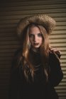 Sensual woman in straw hat — Stock Photo
