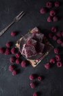 Raspberry jelly on saucer — Stock Photo