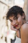 Curly woman with red lipstick — Stock Photo