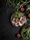 Fresh vegetables and mushrooms in assortment — Stock Photo