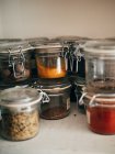 Closeup view of different spices in jars — Stock Photo