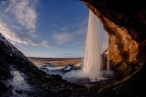 Waterfall flowing in rocks — Stock Photo