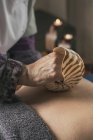 Therapist doing oriental massage — Stock Photo