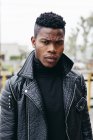 Black man in leather jacket — Stock Photo