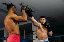 Men training and boxing — Stock Photo