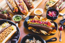 Various served hot dogs — Stock Photo
