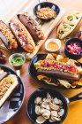 Served hot dogs and snacks — Stock Photo