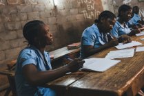 CAMEROON - AFRICA - APRIL 5, 2018: Ethnic women sitting in class in school — Stock Photo